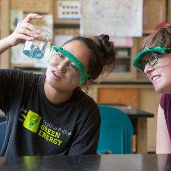 students observing science project