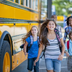 kids next to a school bus