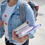 student with books